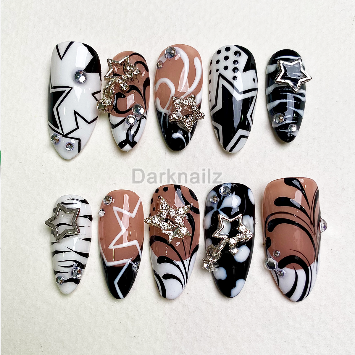 Cosmic Star Chic Press-On Nails – Black Nude Abstract Fake Nails