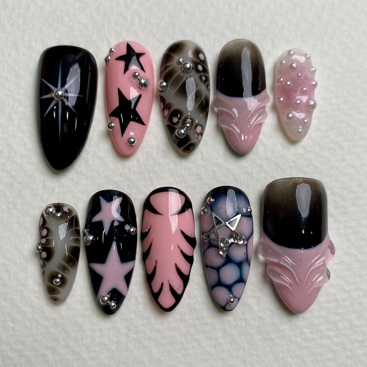 Black Pink Stardust Press-On Nails – Bold Gothic Fake Nails with Stars & Smoky Marble Effect
