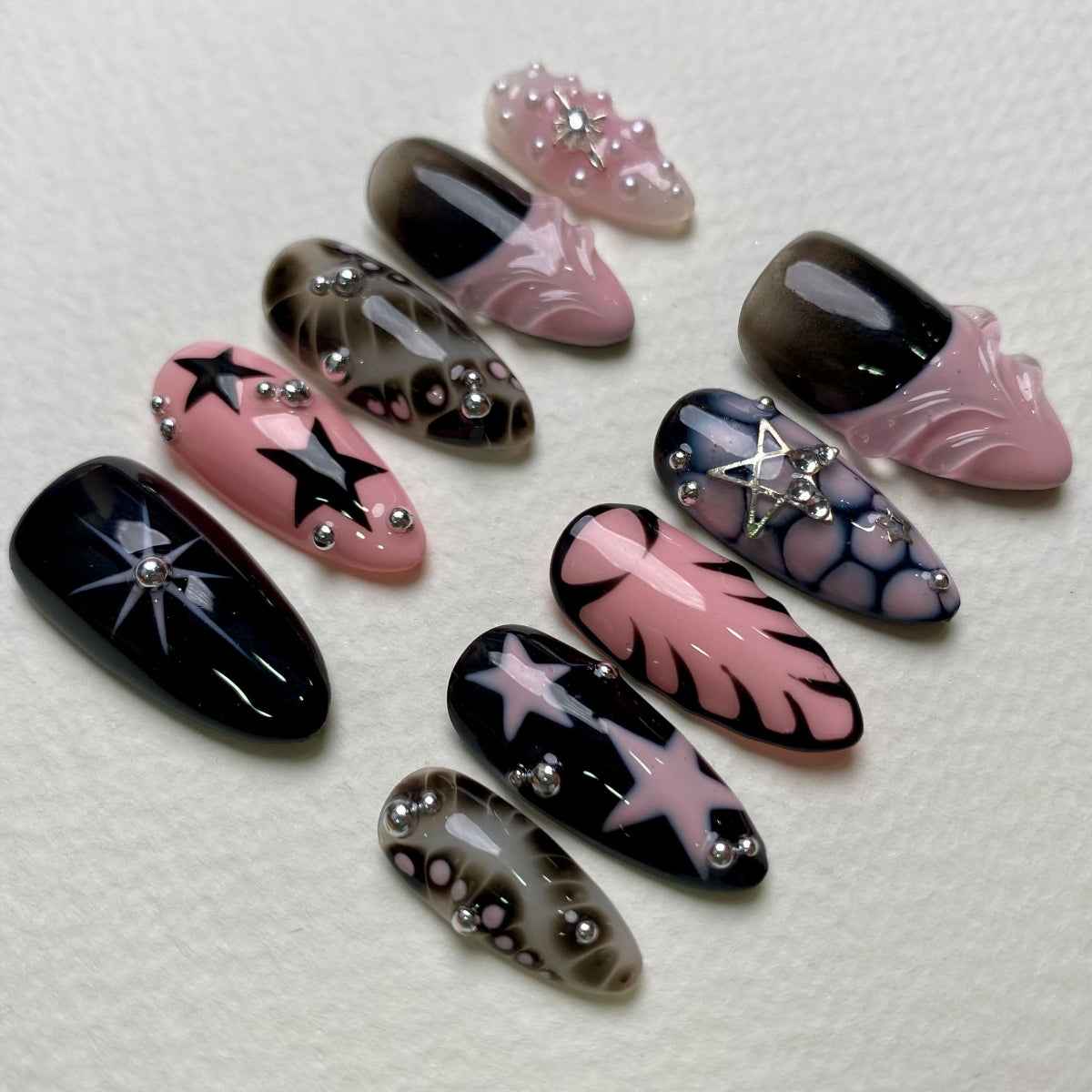 Black Pink Stardust Press-On Nails – Bold Gothic Fake Nails with Stars & Smoky Marble Effect