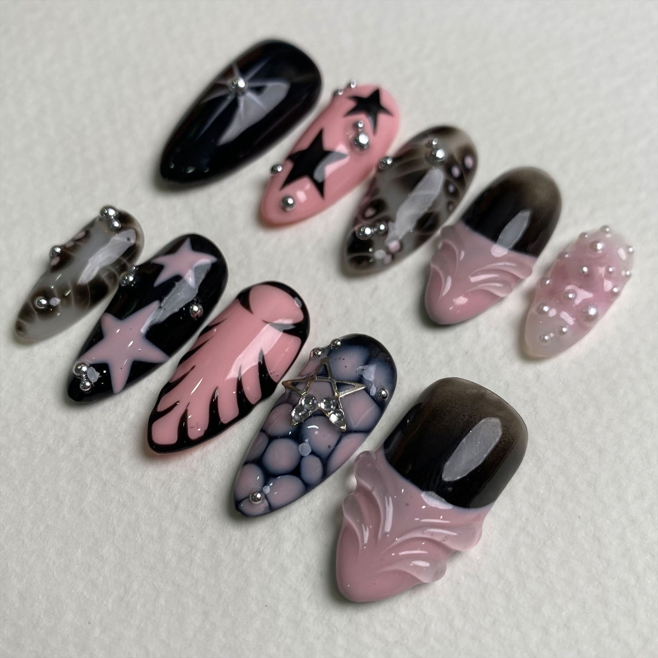 Black Pink Stardust Press-On Nails – Bold Gothic Fake Nails with Stars & Smoky Marble Effect