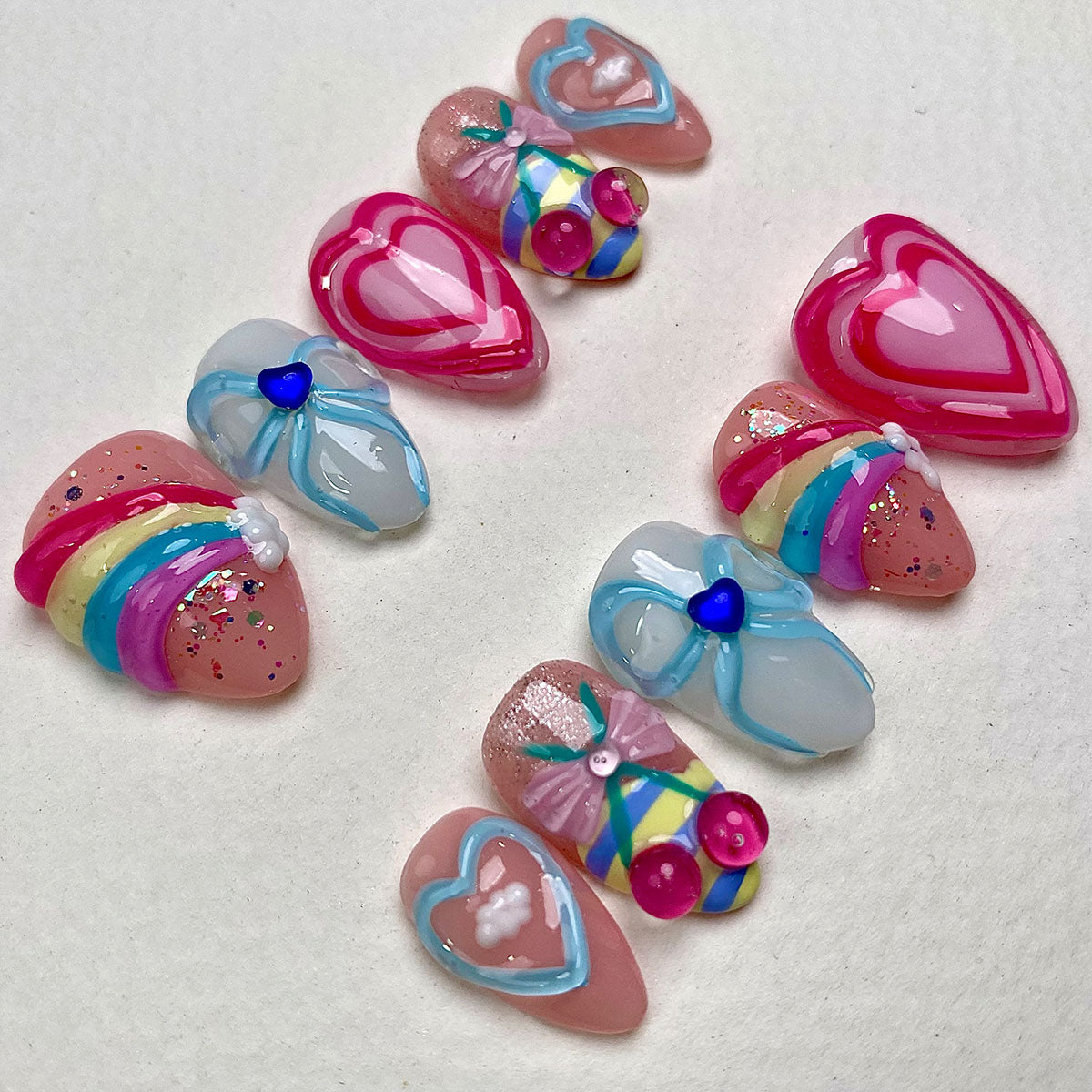 Rainbow Crush – Pink Press-On Nails, Kawaii Fake Nails with Heart, Bow and Pastel Charms