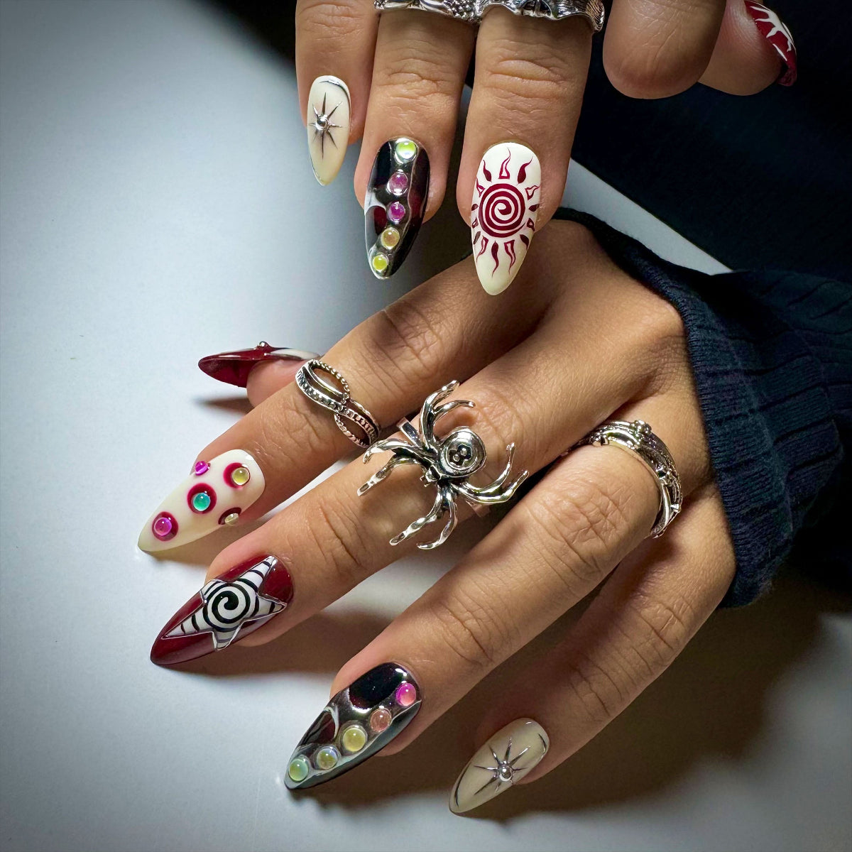 Celestial Chaos Press-On Nails – Burgundy Cream Fake Nails with Sun, Stars & Swirl Designs
