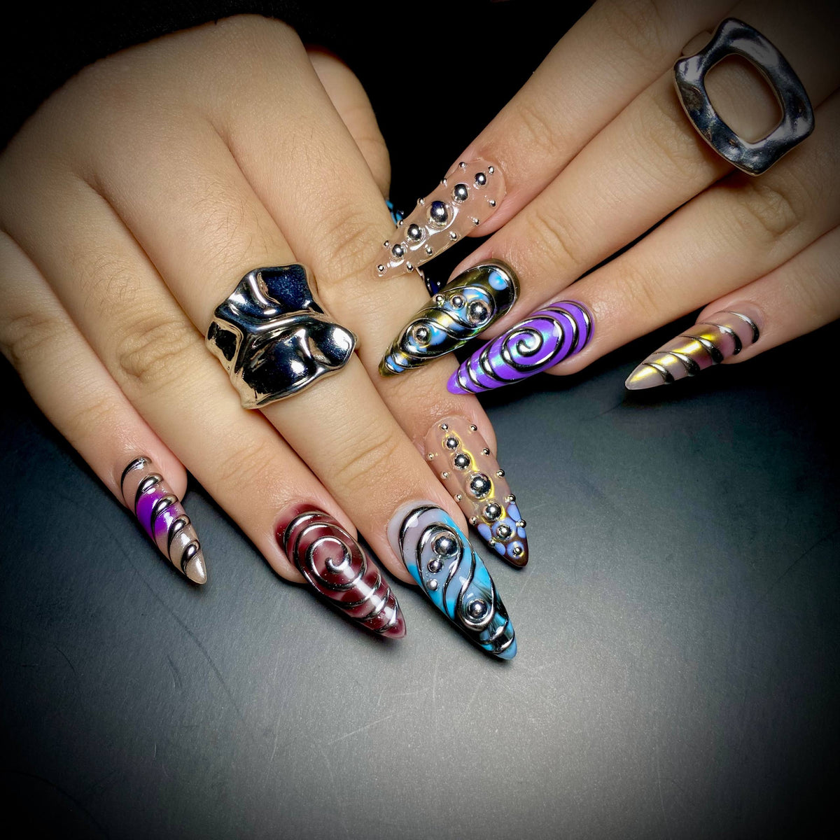 Colorful Silver Chrome Y2K Press-On Nails – 3D Metallic Swirl Cyber Fake Nails