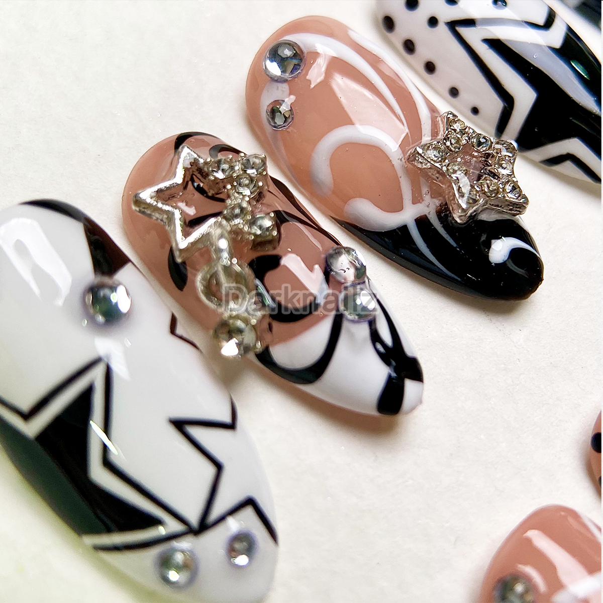 Cosmic Star Chic Press-On Nails – Black Nude Abstract Fake Nails