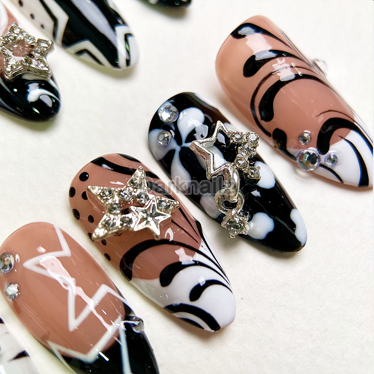 Cosmic Star Chic Press-On Nails – Black Nude Abstract Fake Nails