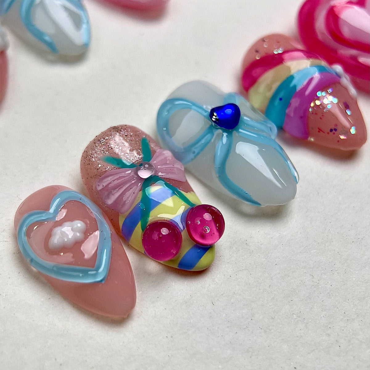 Rainbow Crush – Pink Press-On Nails, Kawaii Fake Nails with Heart, Bow and Pastel Charms