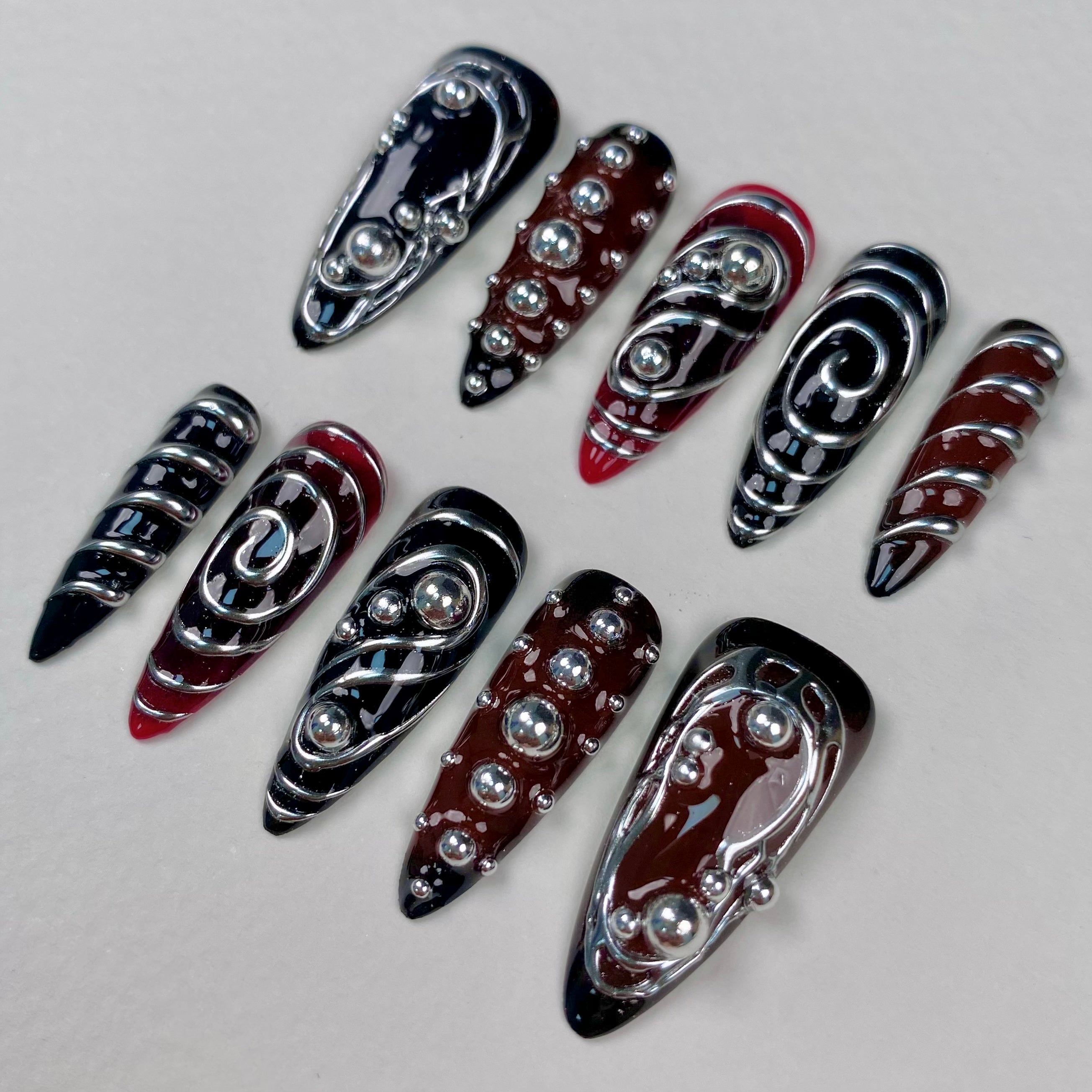 Red Black Silver Chrome Y2K Press-On Nails – 3D Metallic Swirl Cyber Fake Nails