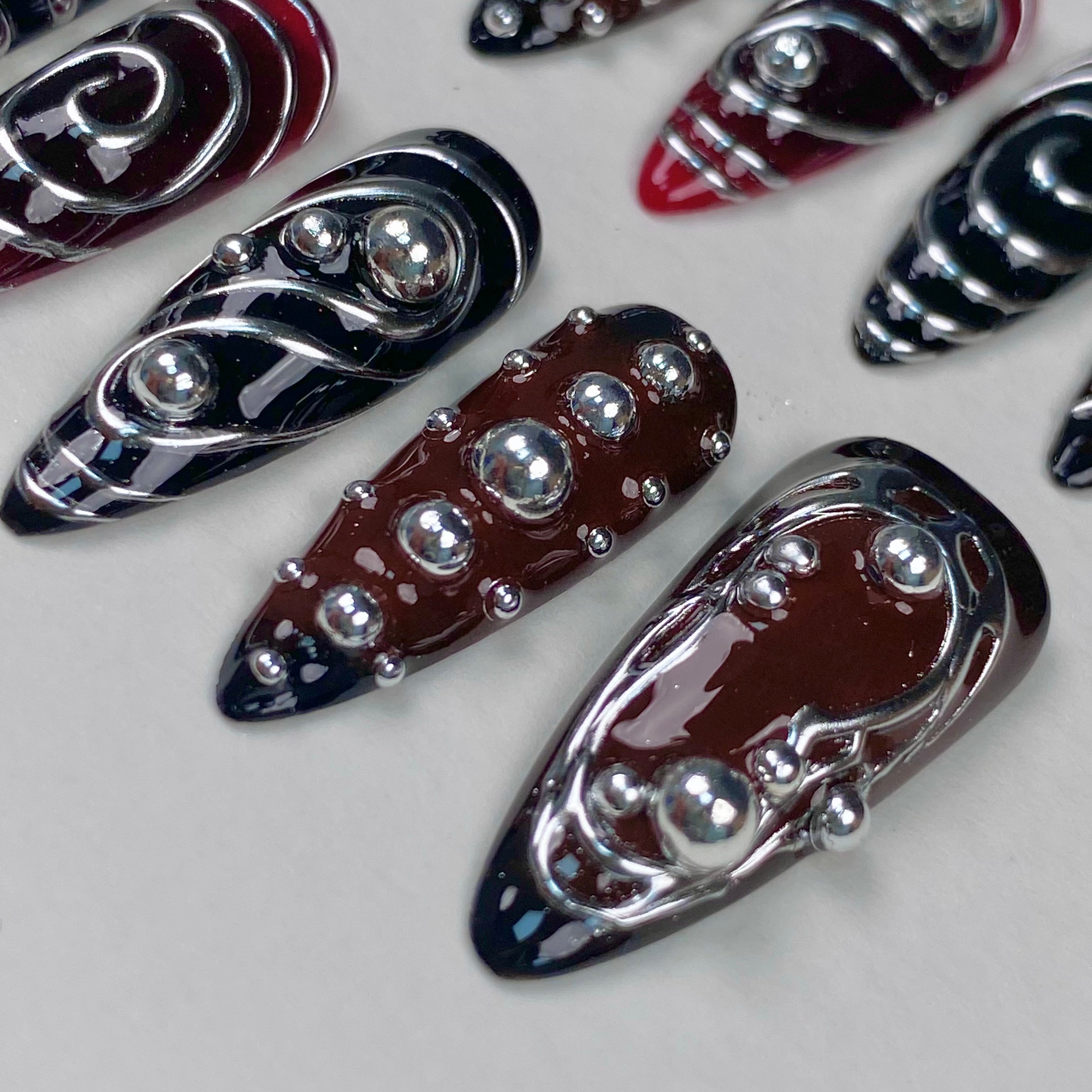 Red Black Silver Chrome Y2K Press-On Nails – 3D Metallic Swirl Cyber Fake Nails
