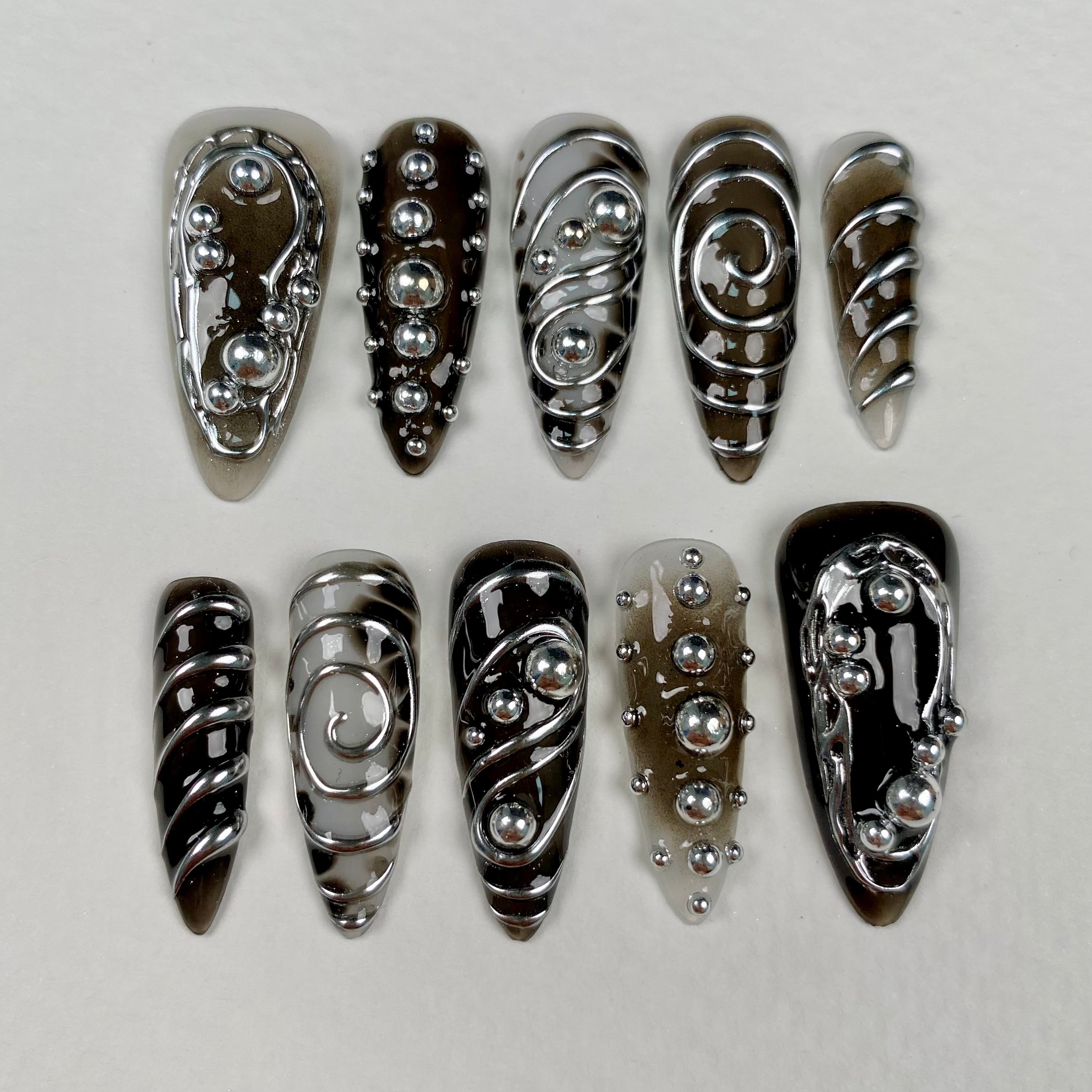 Gray Silver Chrome Y2K Press-On Nails – 3D Metallic Swirl Cyber Fake Nails